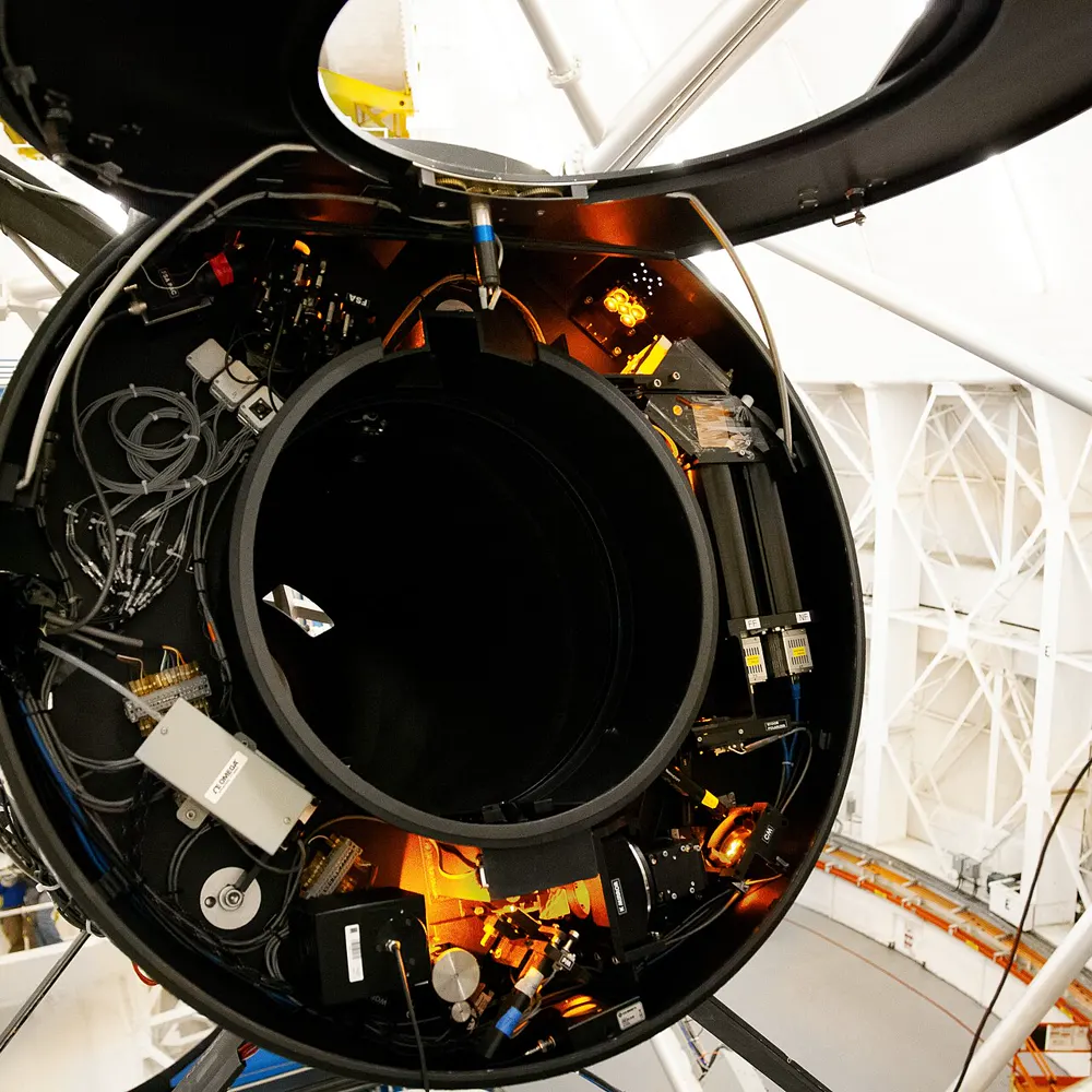 The electronics bay of a large optical instrument, open for service