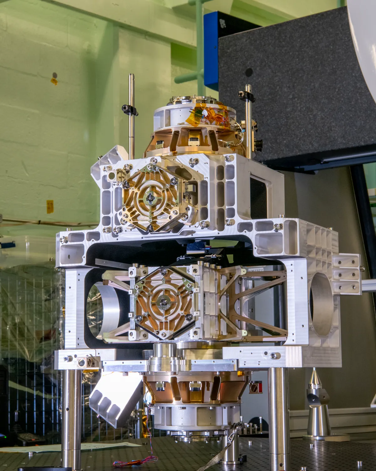 An optical bench assembly on its stand in a cleanroom